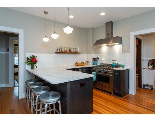 20 Riverview Terrace Springfield, MA 01108 - Photo 9 of 30 a kitchen with a stove and a wooden floor