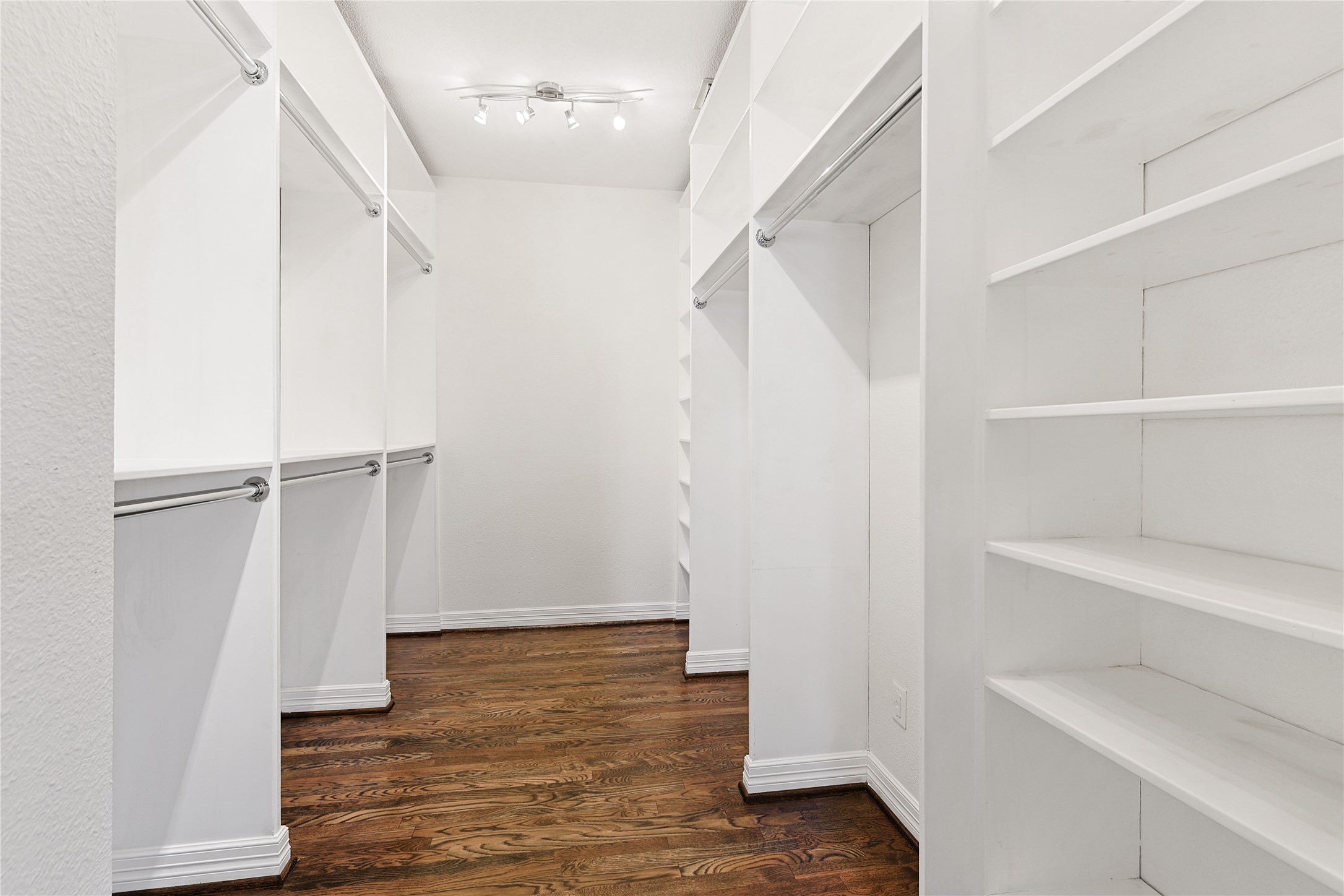 801 Knox Street Houston, TX 77007 - Photo 16 of 33 a view of an empty walk in closet