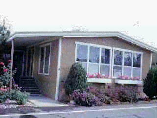 340 Old Mill Road Santa Barbara, CA 93110 - Photo 2 of 2 a front view of a house with a garden