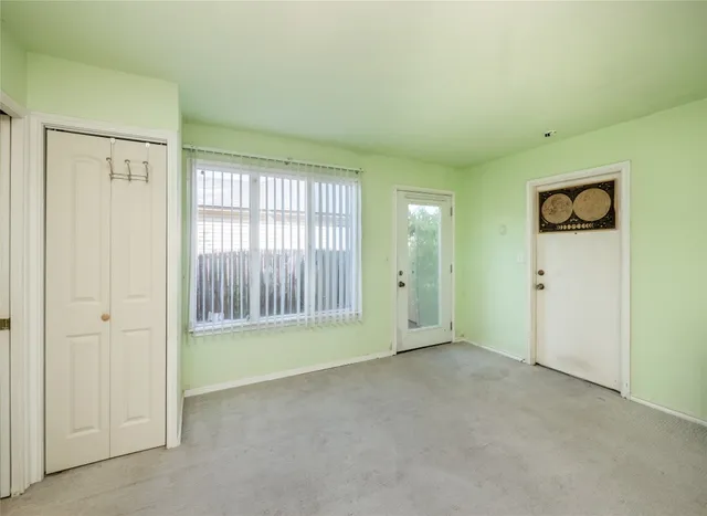 an empty room with windows