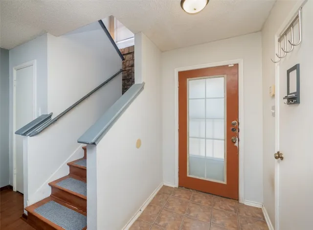 a view of entryway with wooden floor