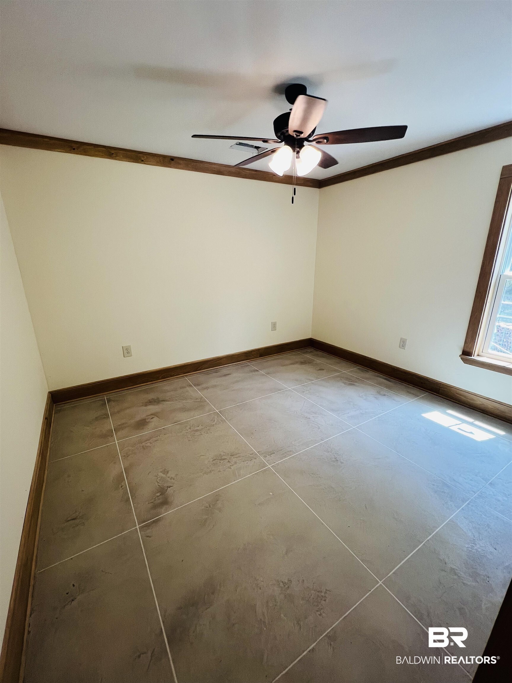29685 Gardner Road Elberta, AL 36530 - Photo 10 of 16 Neutral-toned walls complement the large format tiled flooring