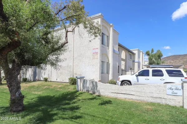a view of a swimming pool with a lounge chairs