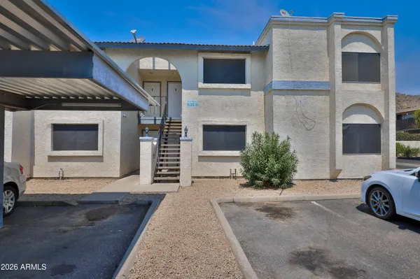 a view of a back yard of the house