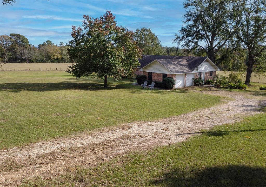 15377 County Road 1134 Tyler, TX 75709 - Photo 11 of 16 a view of a house with a yard and lake view
