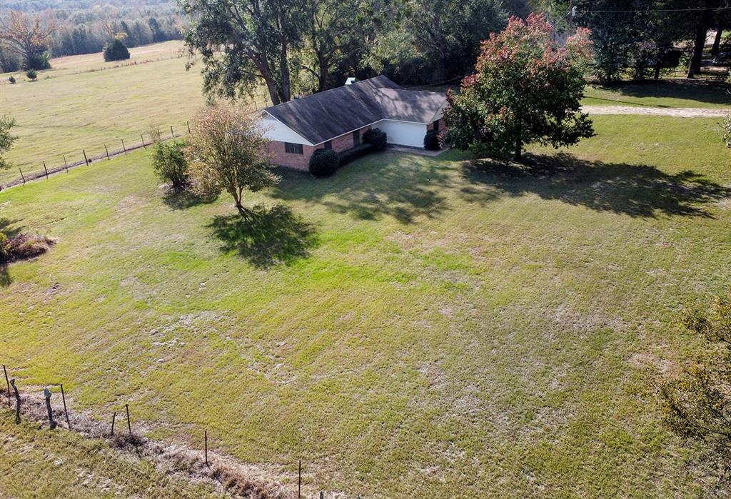 15377 County Road 1134 Tyler, TX 75709 - Photo 13 of 16 a view of a lake with a yard