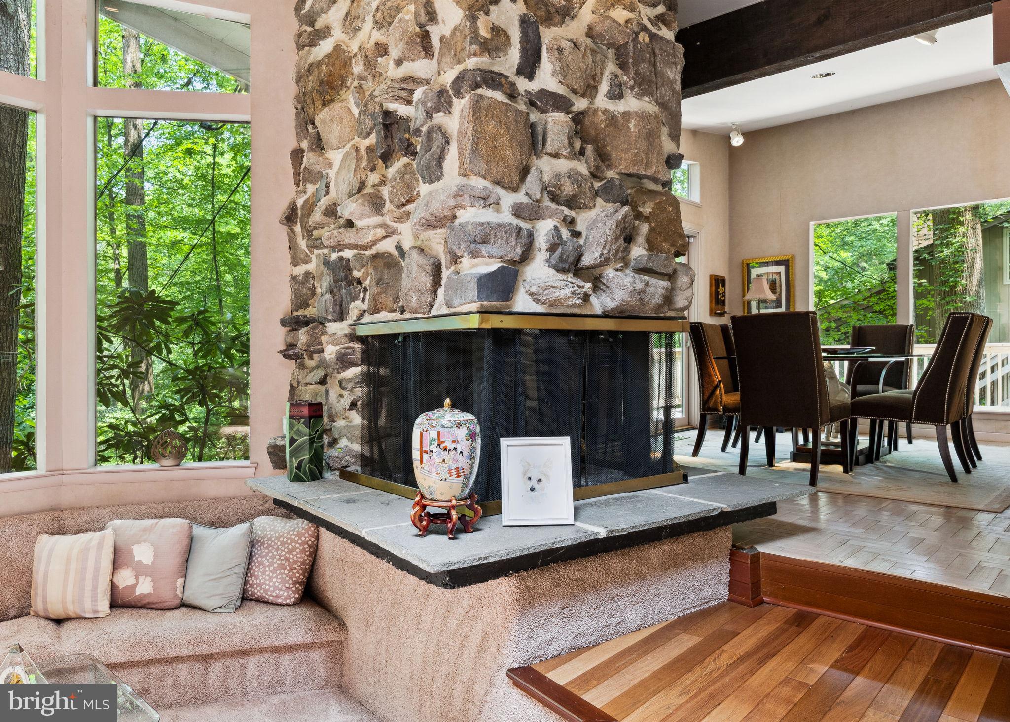 100 Pugh Road Wayne, PA 19087 - Photo 11 of 57 a living room with furniture and a fireplace