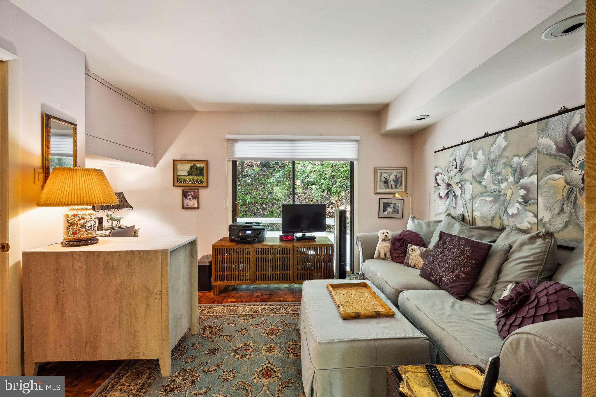 100 Pugh Road Wayne, PA 19087 - Photo 27 of 57 a living room with furniture and a window