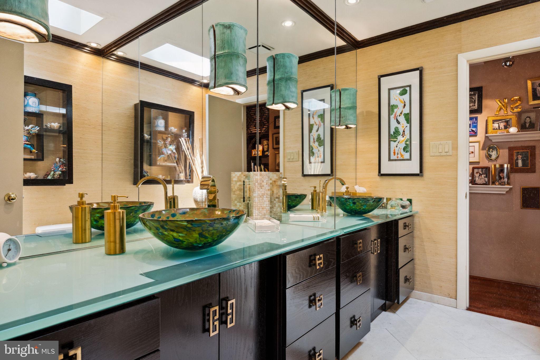100 Pugh Road Wayne, PA 19087 - Photo 36 of 57 a bathroom with a granite countertop sink a large mirror and shower