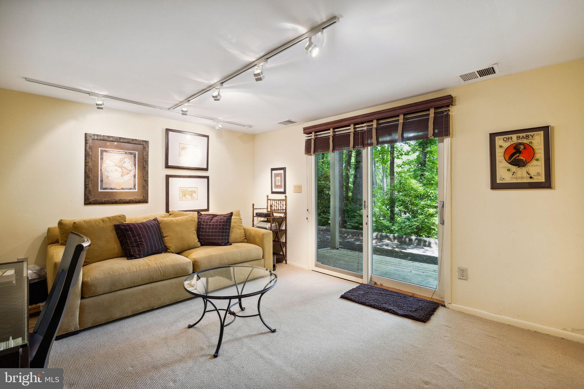 100 Pugh Road Wayne, PA 19087 - Photo 40 of 57 a living room with furniture and a large window