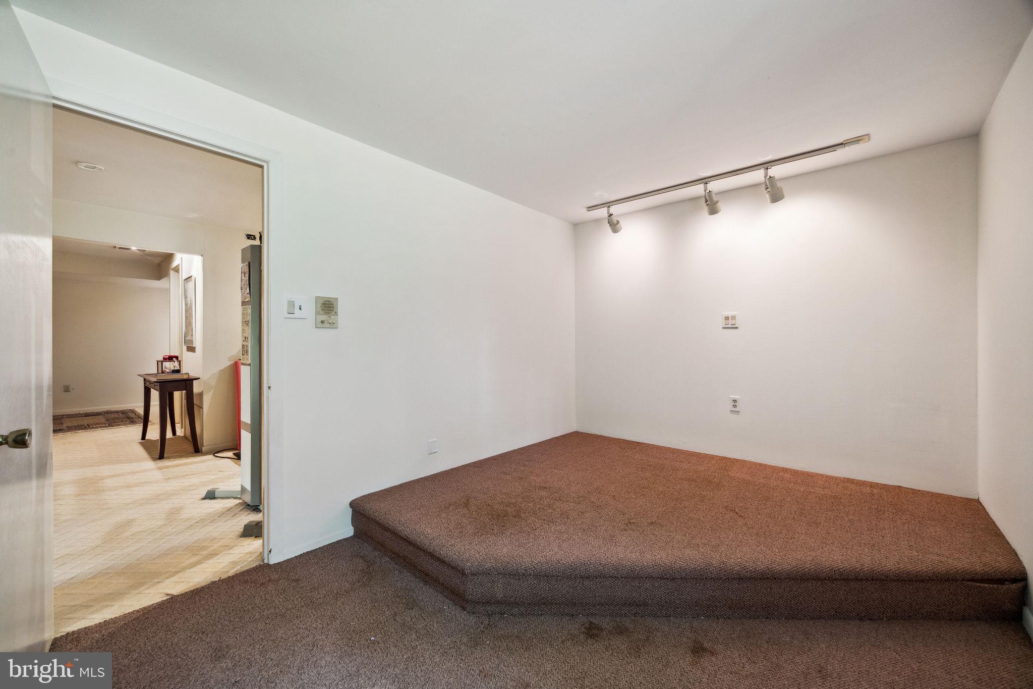 100 Pugh Road Wayne, PA 19087 - Photo 43 of 57 a room with a bed and a view of bathroom