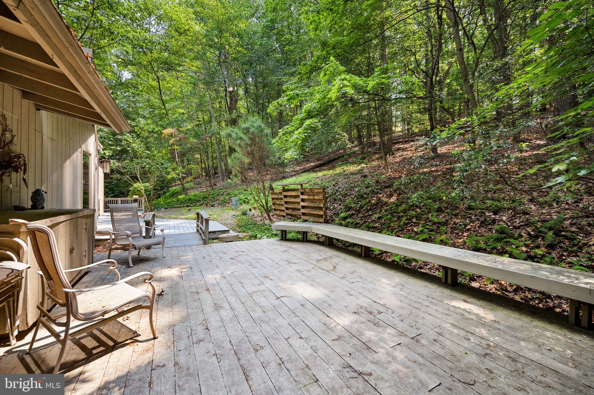 100 Pugh Road Wayne, PA 19087 - Photo 46 of 57 a view of a chair and tables in the balcony