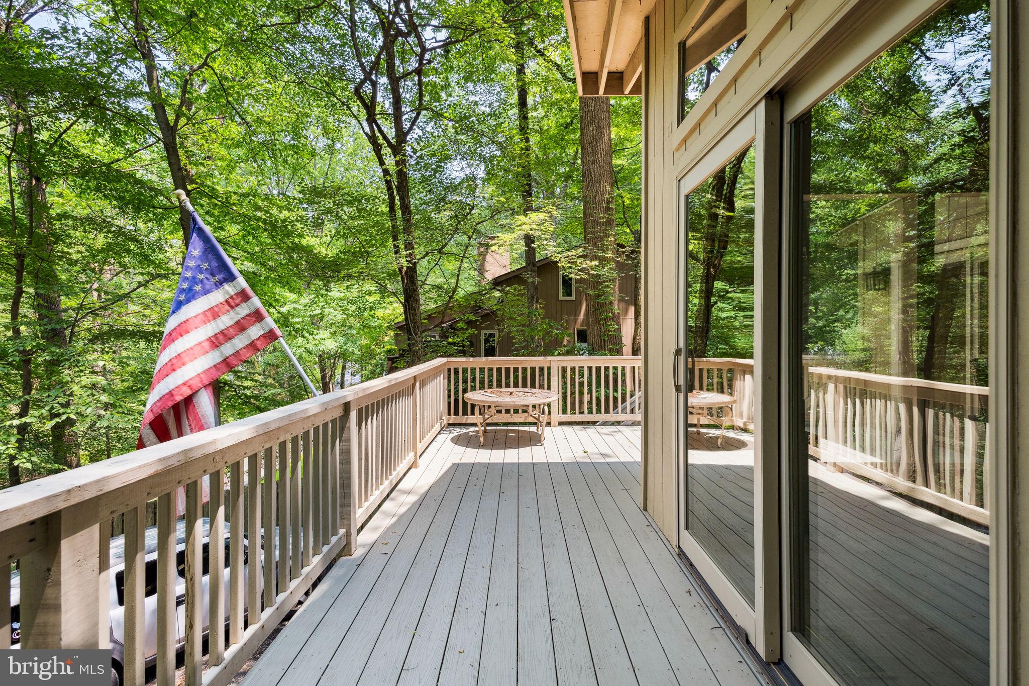 100 Pugh Road Wayne, PA 19087 - Photo 53 of 57 a view of balcony with deck and wooden floor