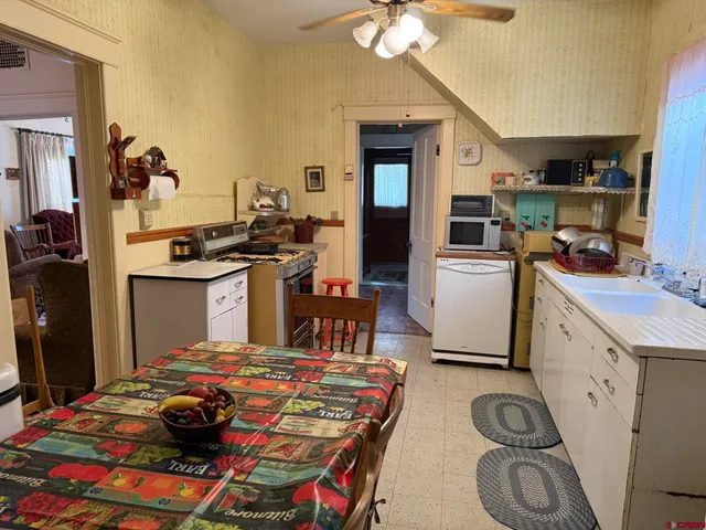 a bedroom with a bed and cabinets