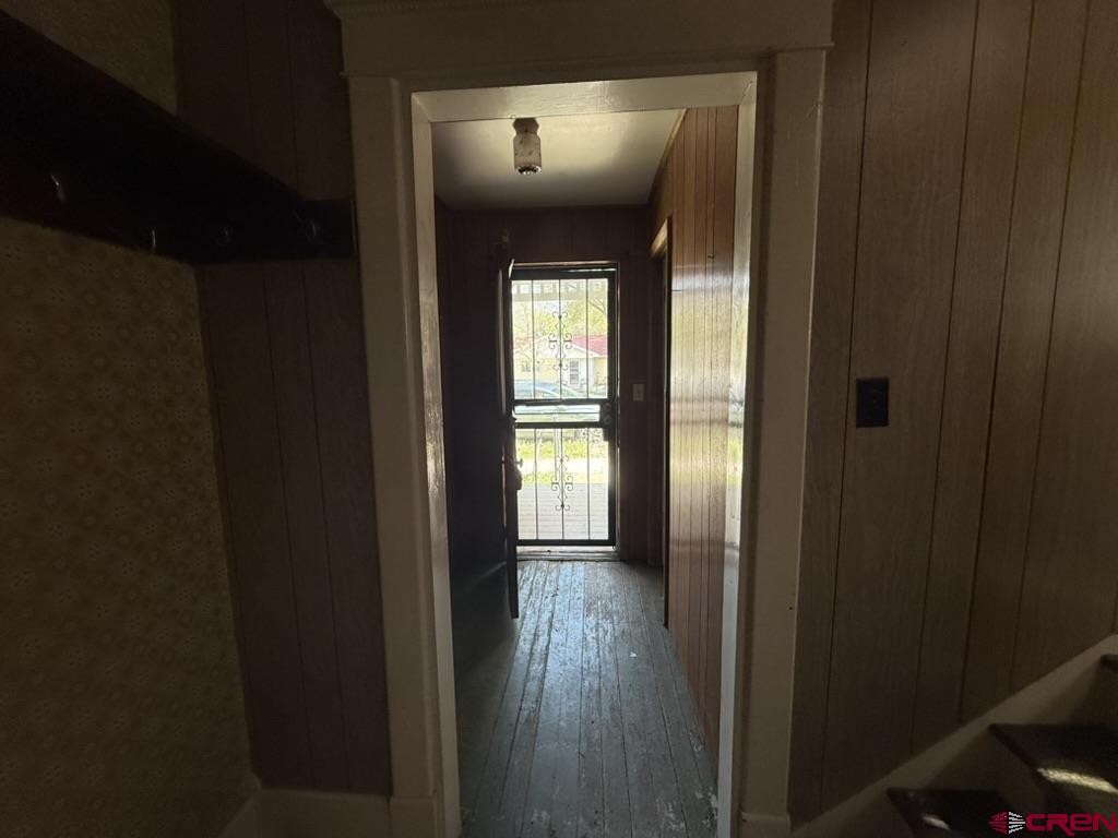 613 3rd Street Paonia, CO 81428 - Photo 23 of 44 a view of empty room with wooden floor and fan