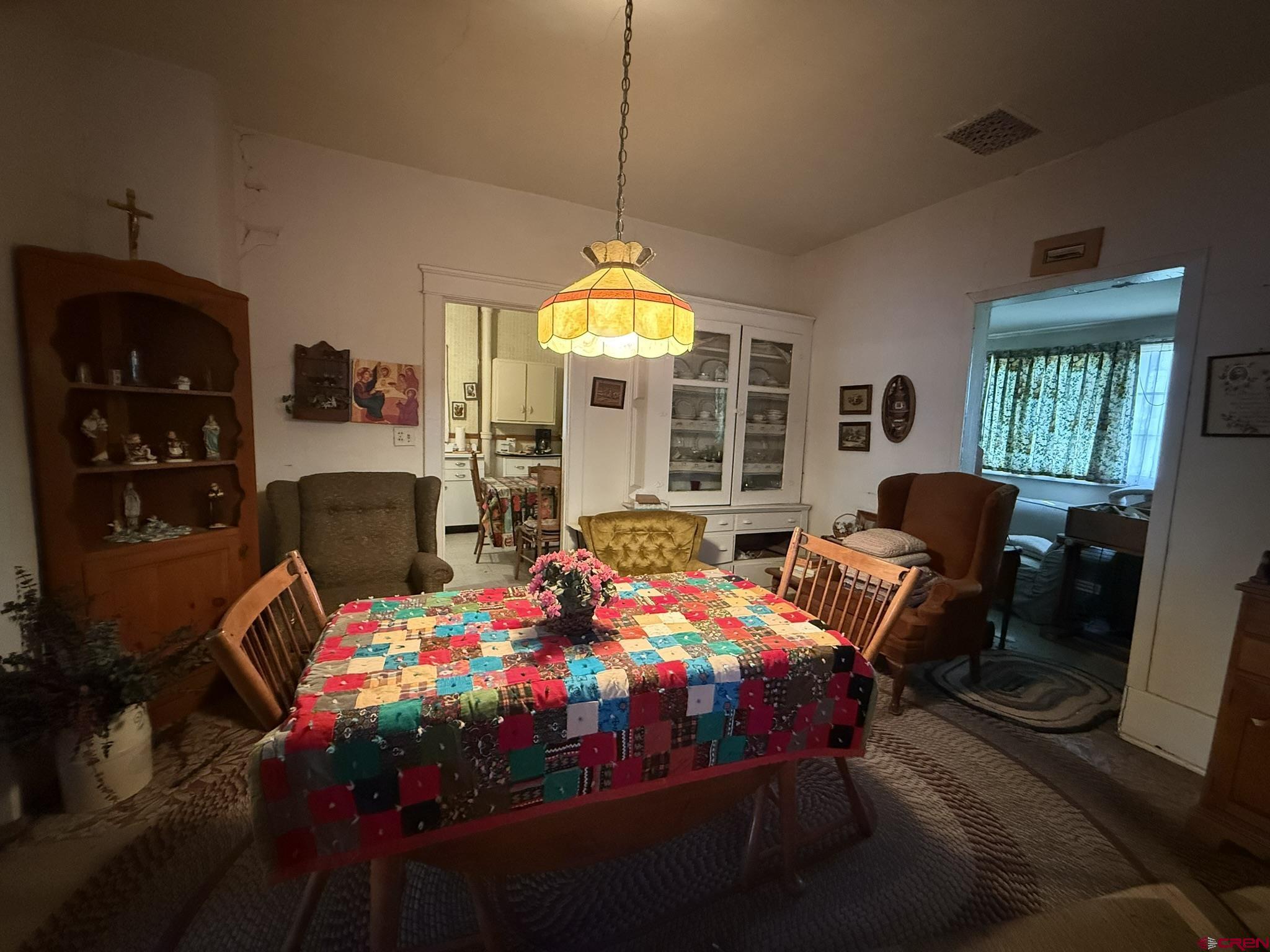 613 3rd Street Paonia, CO 81428 - Photo 38 of 44 a bedroom with a bed a couch and dresser