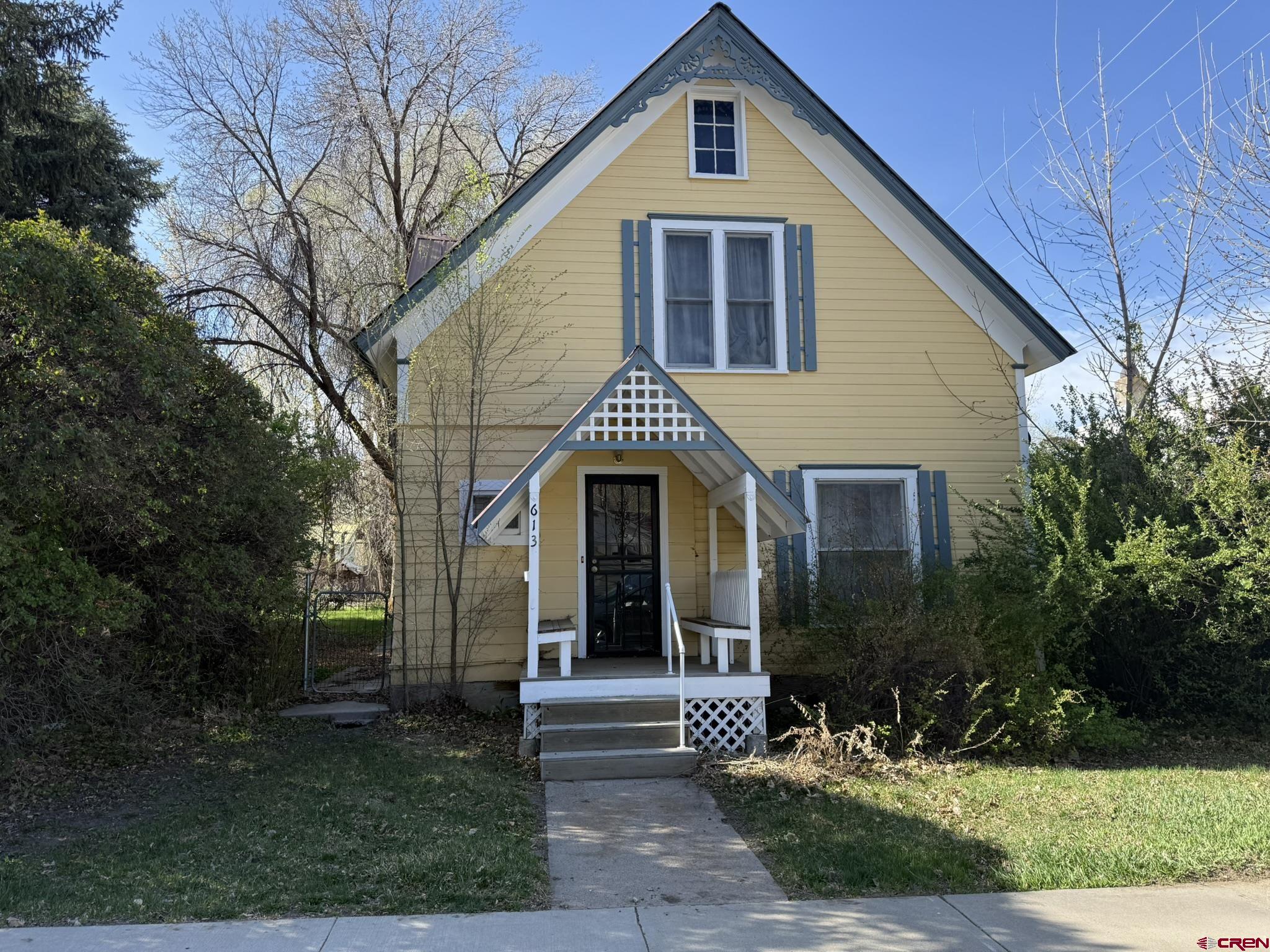 613 3rd Street Paonia, CO 81428 - Photo 5 of 33 a front view of a house with garden