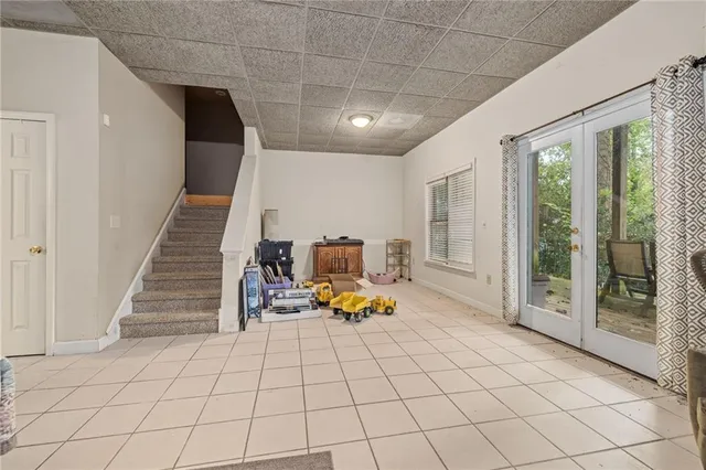 a view of an entryway with wooden floor