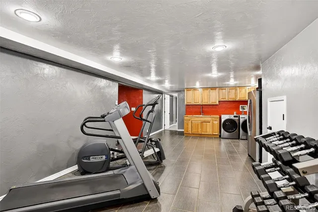 a gym room with gym equipment