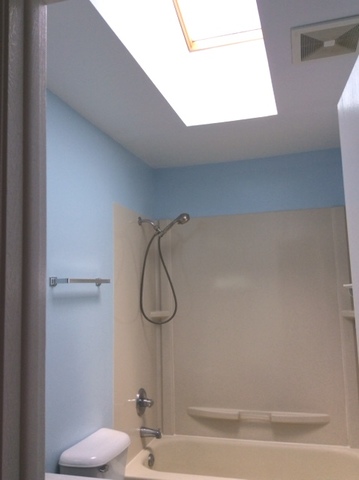 148 Innsbrook Drive Streamwood, IL 60107 - Photo 14 of 19 a bathroom with a shower and a toilet