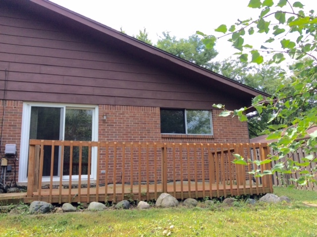148 Innsbrook Drive Streamwood, IL 60107 - Photo 19 of 19 a backyard of a house with lots of green space