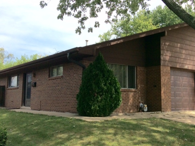 148 Innsbrook Drive Streamwood, IL 60107 - Photo 2 of 19 a view of a backyard of the house
