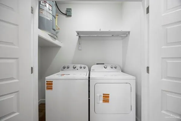 a utility room with dryer and washer