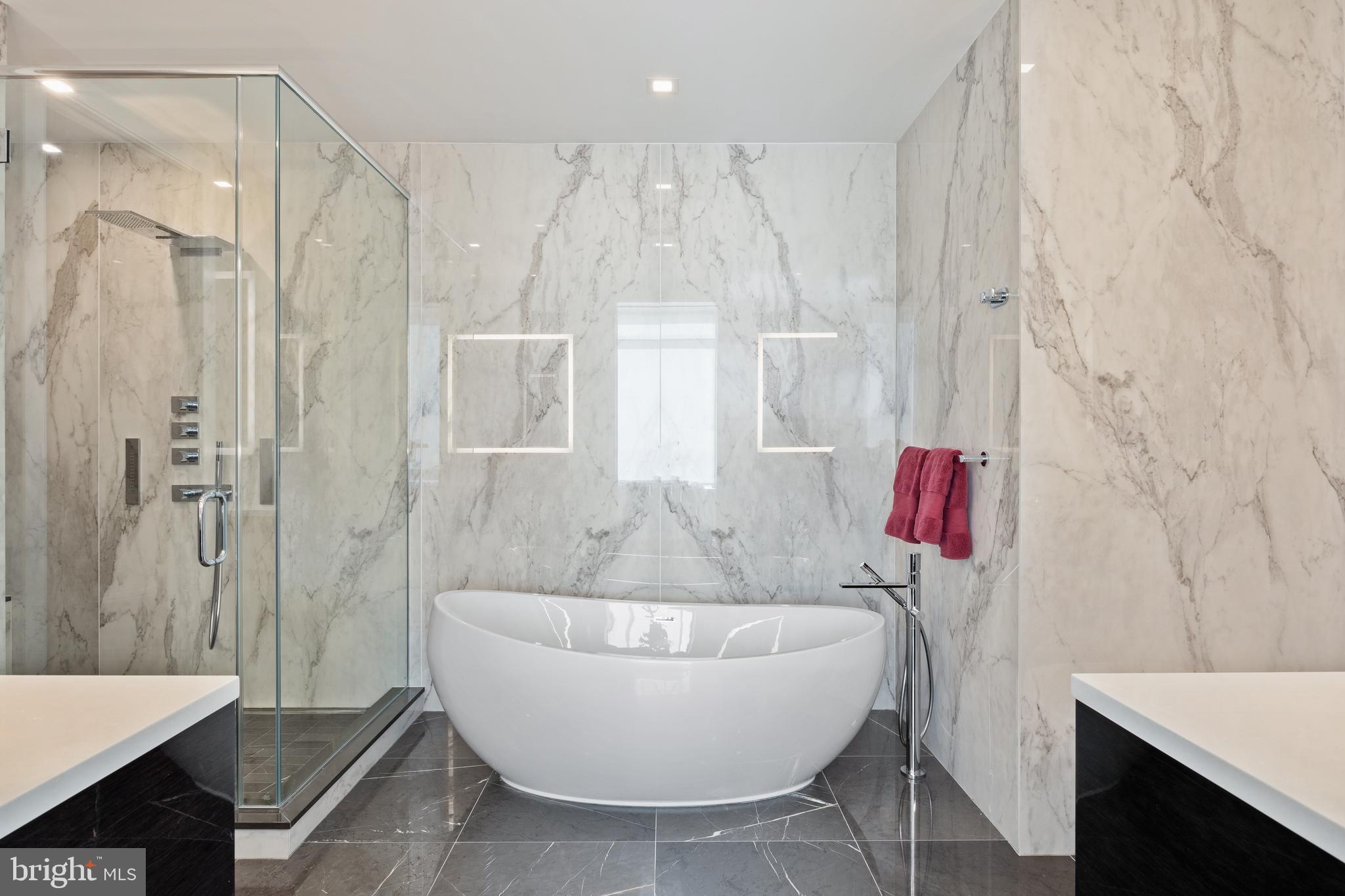 1911 Walnut Street, Unit 3301 Philadelphia, PA 19103 - Photo 18 of 50 a bathroom with a bathtub and shower