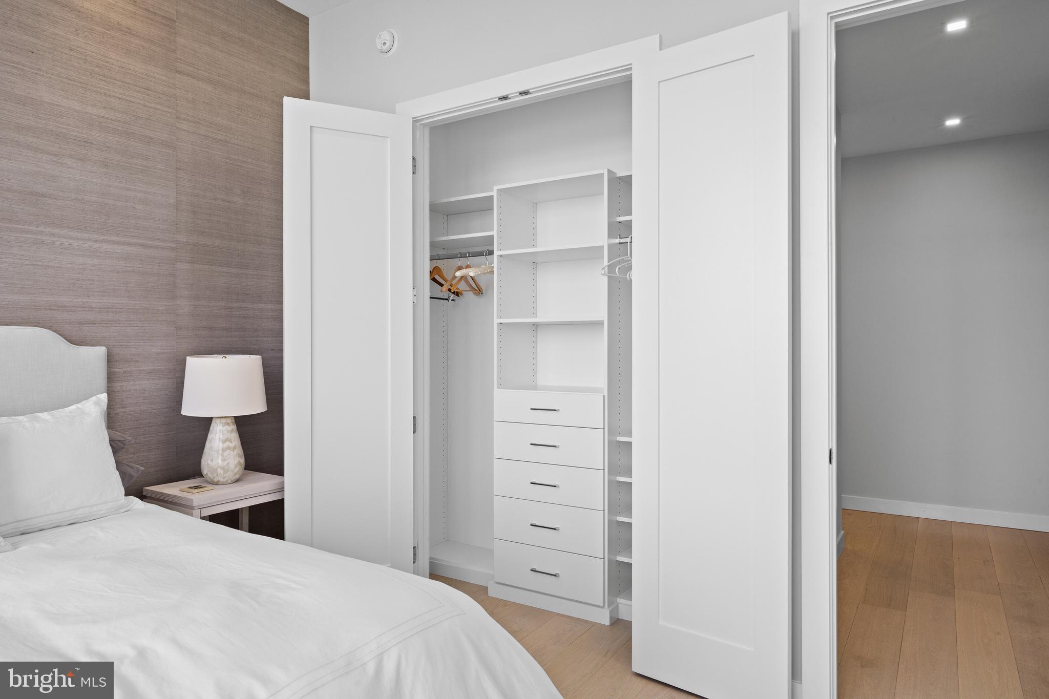 1911 Walnut Street, Unit 3301 Philadelphia, PA 19103 - Photo 27 of 50 a bedroom with a bed and a closet