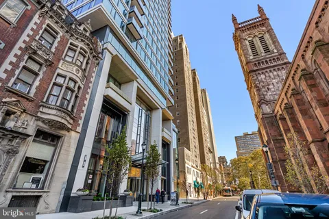 a view of entryway with a chandelier
