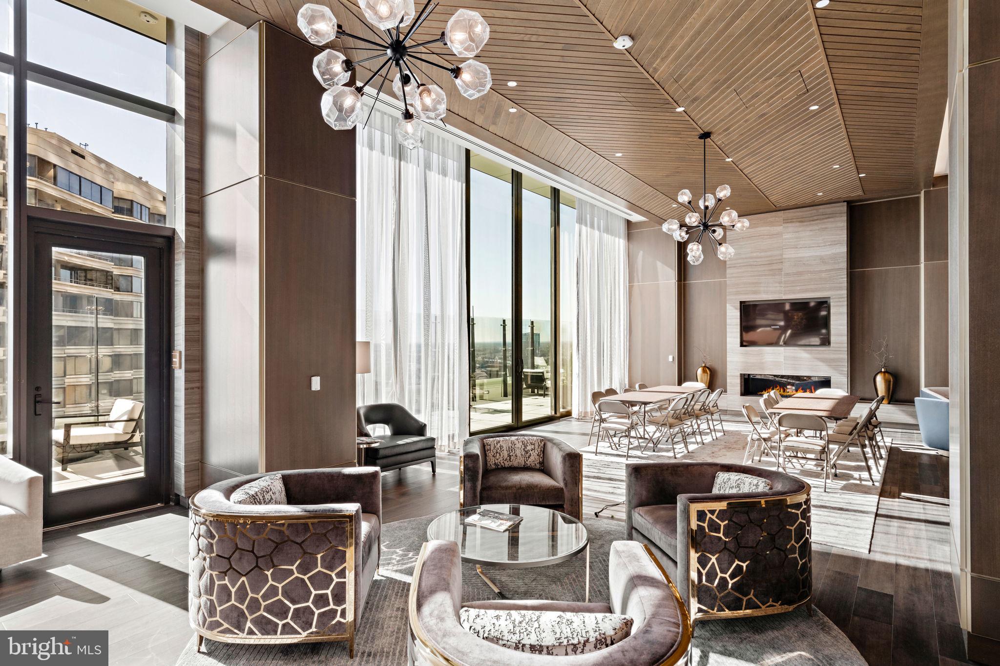 1911 Walnut Street, Unit 3301 Philadelphia, PA 19103 - Photo 43 of 50 a living room with furniture and a large window