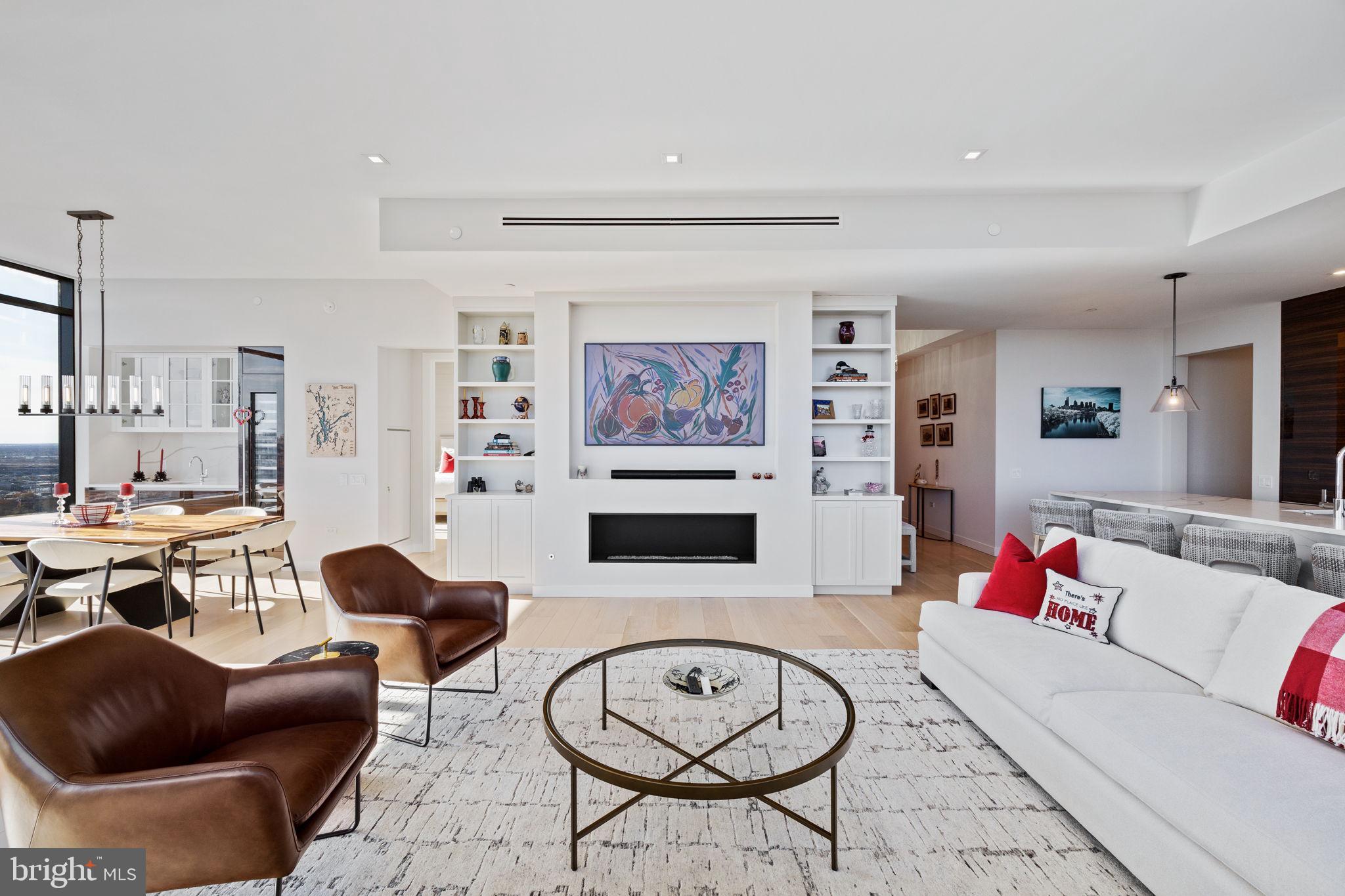 1911 Walnut Street, Unit 3301 Philadelphia, PA 19103 - Photo 10 of 50 a living room with furniture kitchen view and a rug