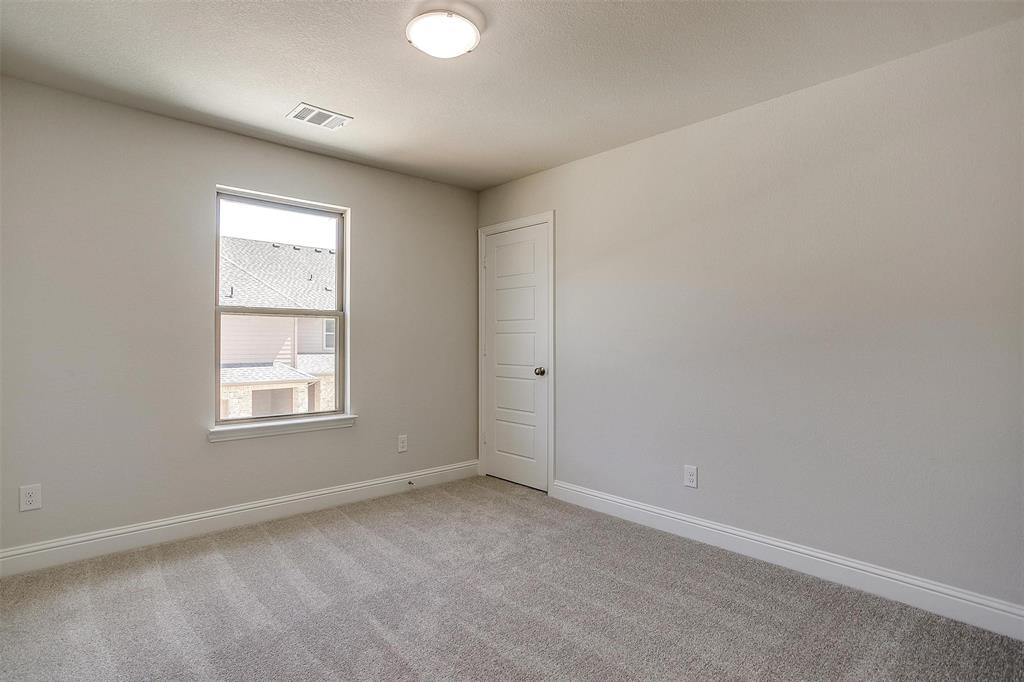 6819 Robert Reed Drive Arlington, TX 76001 - Photo 24 of 32 an empty room with a window