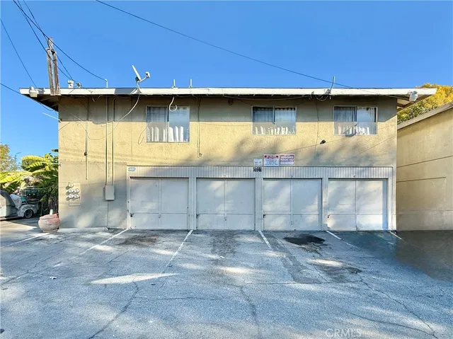 a view of a kitchen with wooden floor