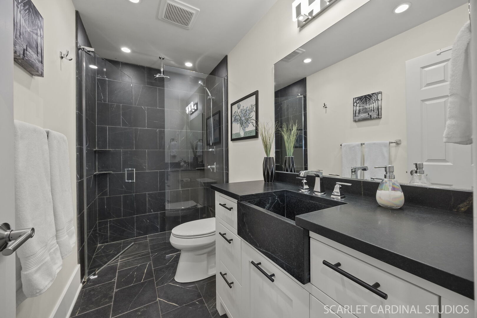 1907 Kingsbrook Court Wheaton, IL 60187 - Photo 17 of 29 a bathroom with a granite countertop sink a toilet a mirror and shower