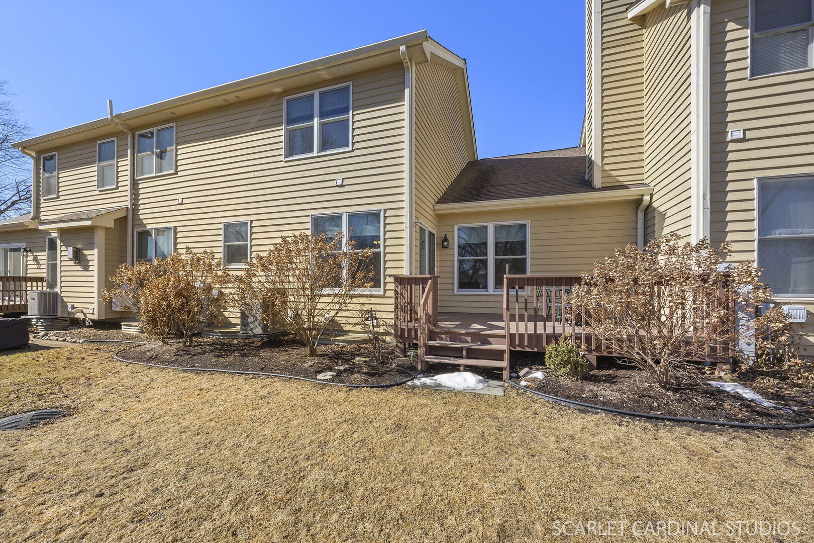 1907 Kingsbrook Court Wheaton, IL 60187 - Photo 25 of 29 a front view of a house with a yard