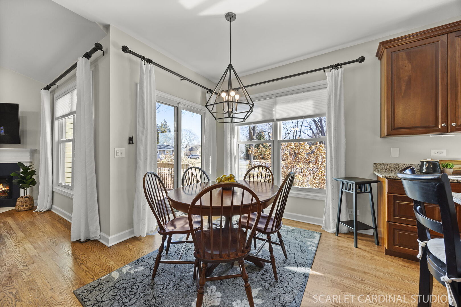 1907 Kingsbrook Court Wheaton, IL 60187 - Photo 7 of 29 a view of a dining room with furniture window and wooden floor