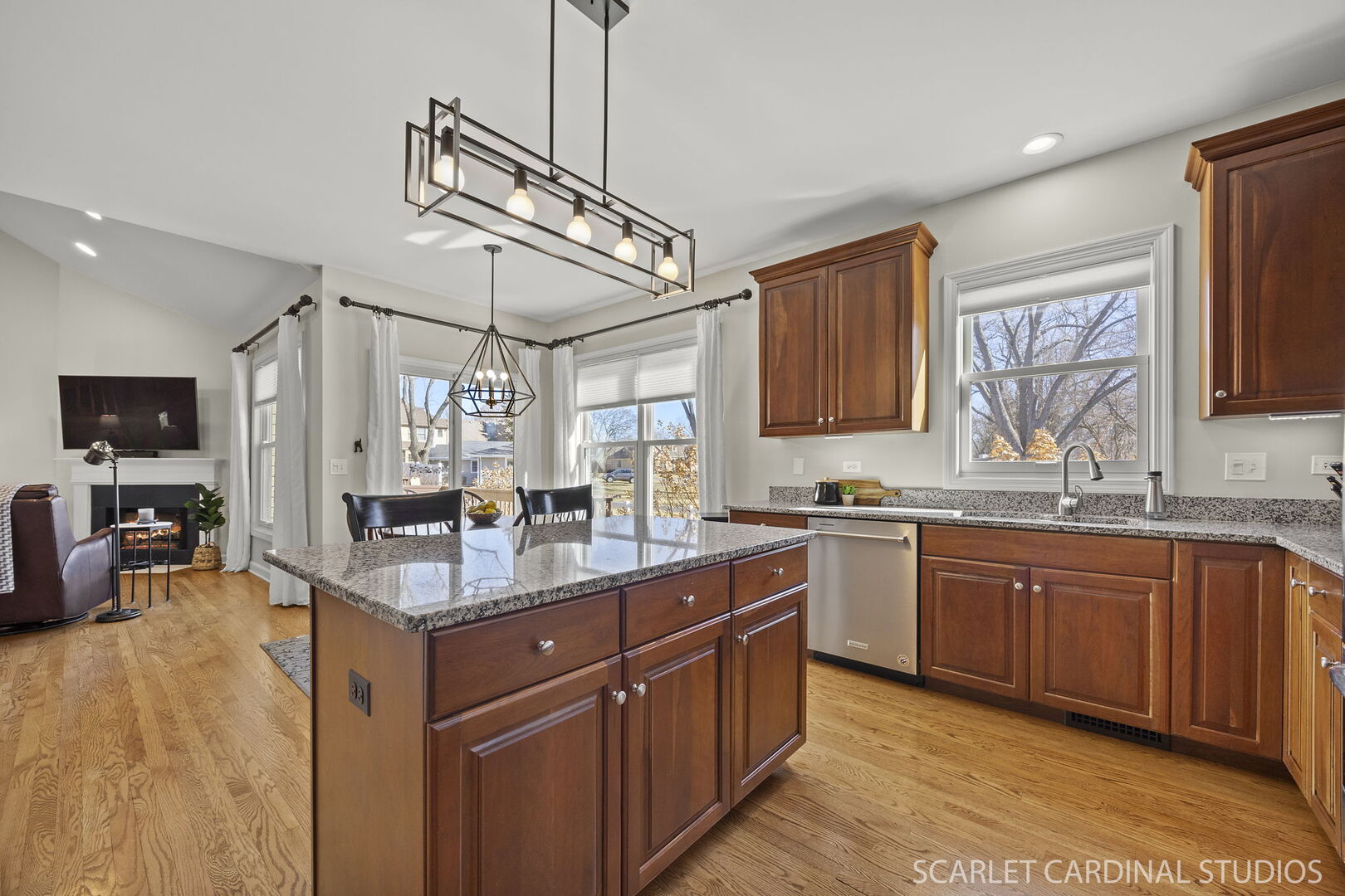 1907 Kingsbrook Court Wheaton, IL 60187 - Photo 9 of 29 a kitchen with lots of counter space sink and a mirror