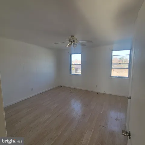 an empty room that has a window