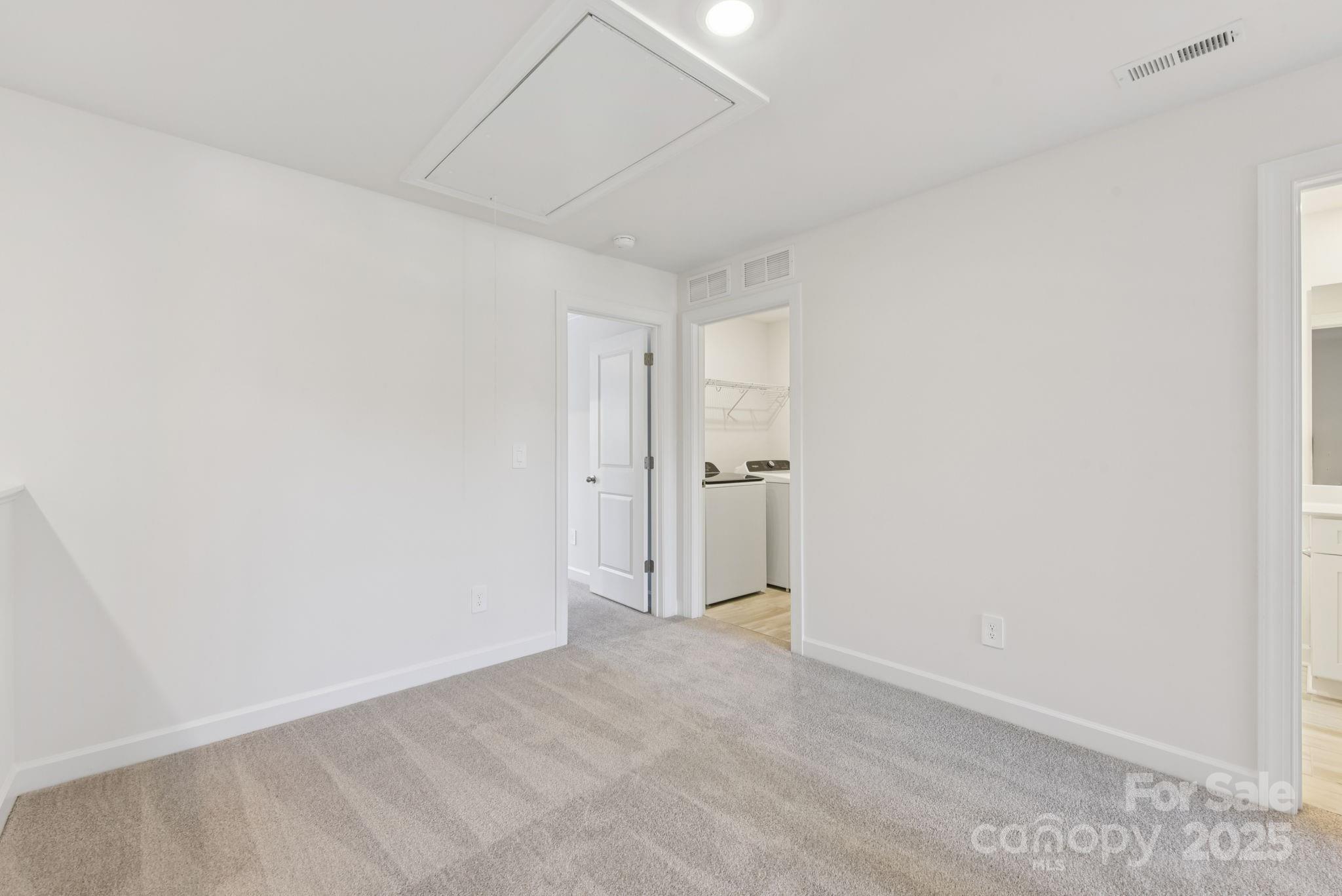 282 Tiger Lily Drive Fort Mill, SC 29708 - Photo 7 of 18 a view of a livingroom with an empty space