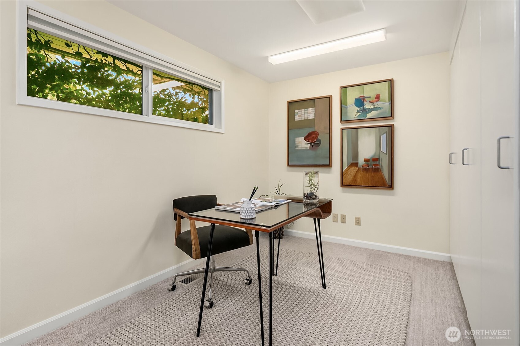 6555 Northeast Windermere Road Seattle, WA 98105 - Photo 30 of 40 a view of a workspace with furniture and a window