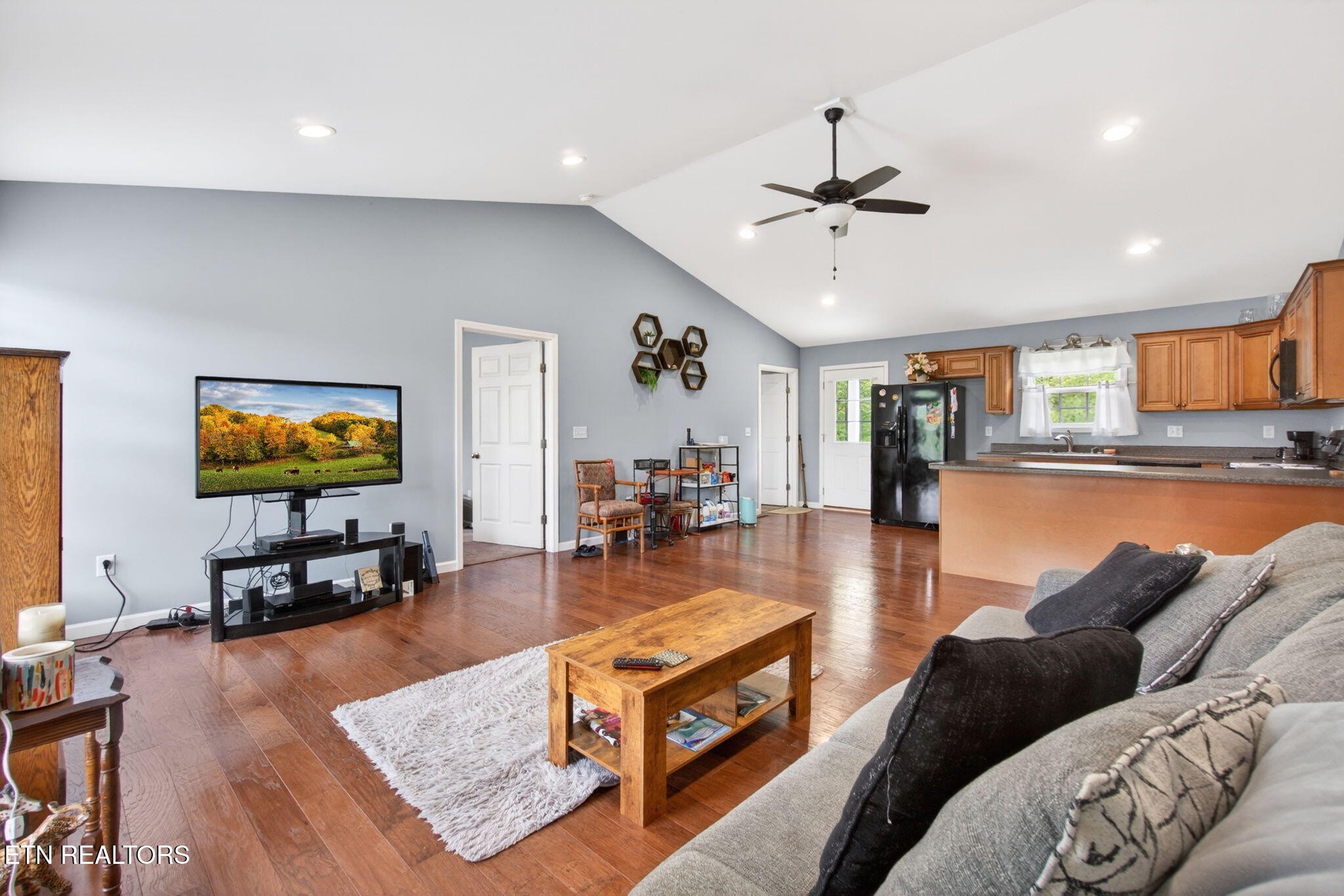 259 Freewill Ridge Road Gainesboro, TN 38562 - Photo 2 of 36 a living room with furniture and a flat screen tv