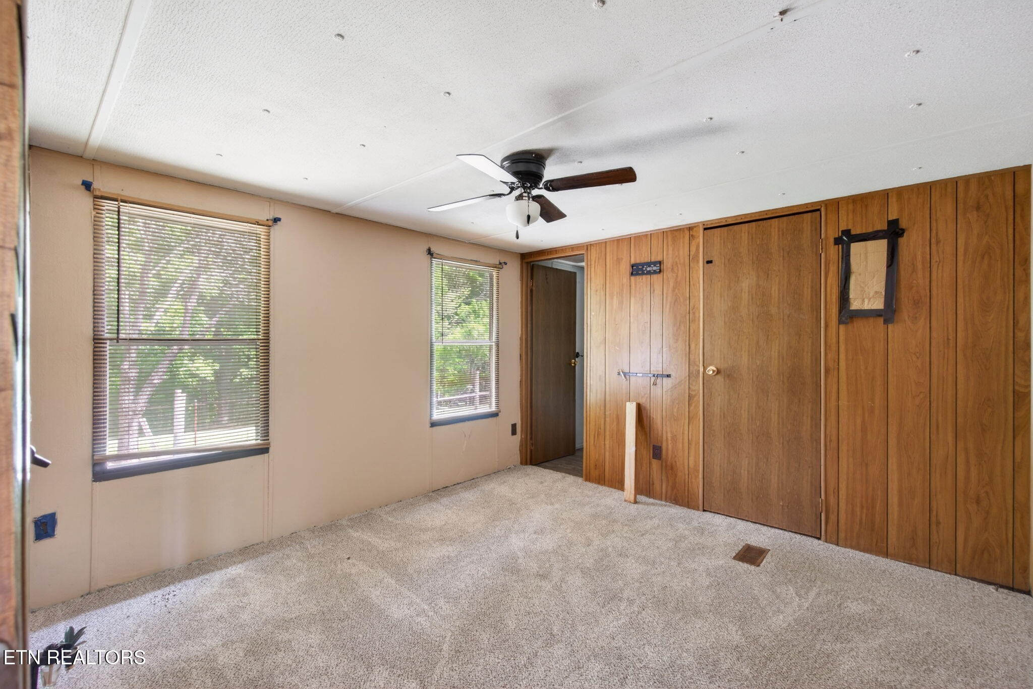 259 Freewill Ridge Road Gainesboro, TN 38562 - Photo 31 of 36 a very nice looking room with a ceiling fan and a window