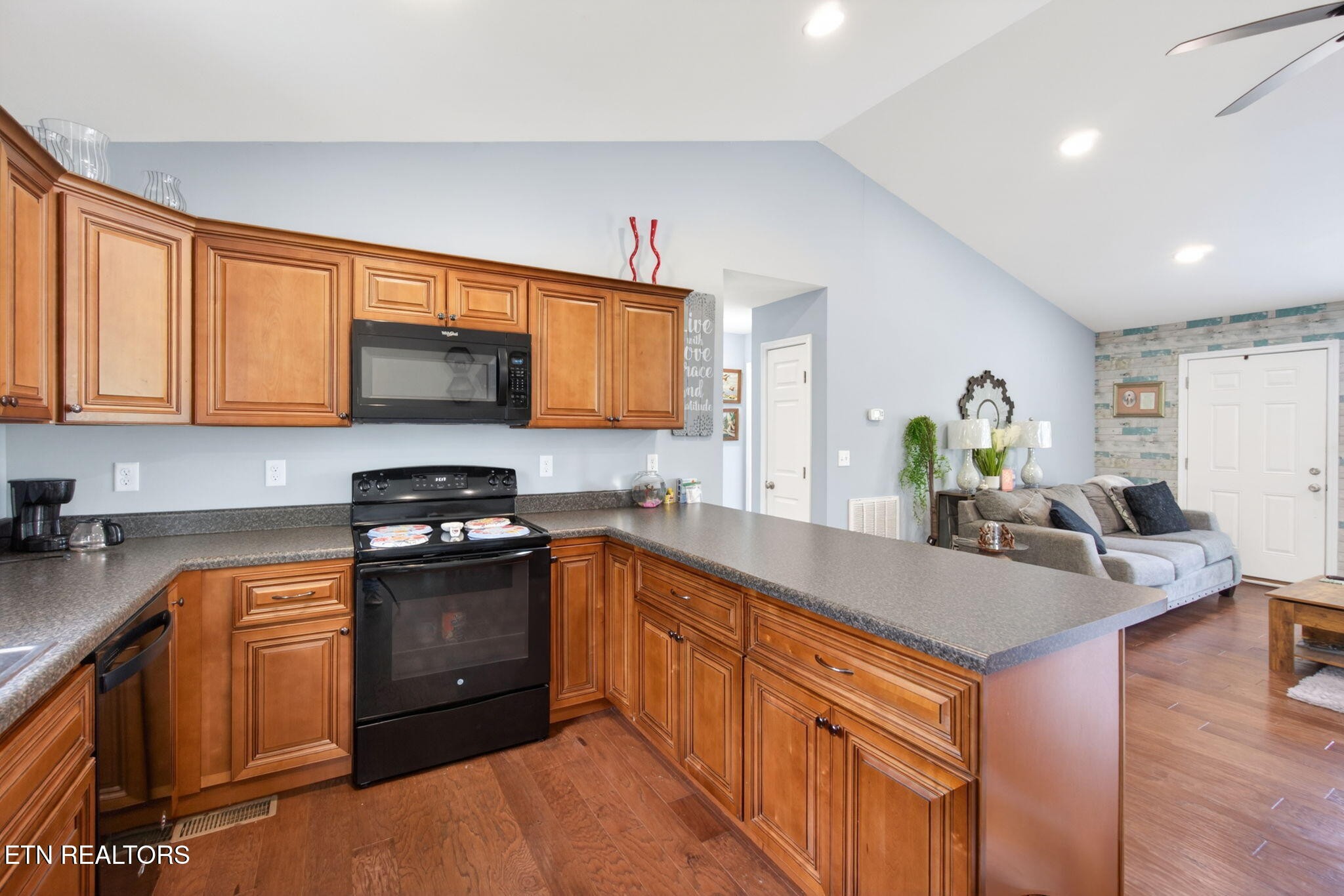 259 Freewill Ridge Road Gainesboro, TN 38562 - Photo 5 of 36 a kitchen with stainless steel appliances granite countertop a sink stove and refrigerator