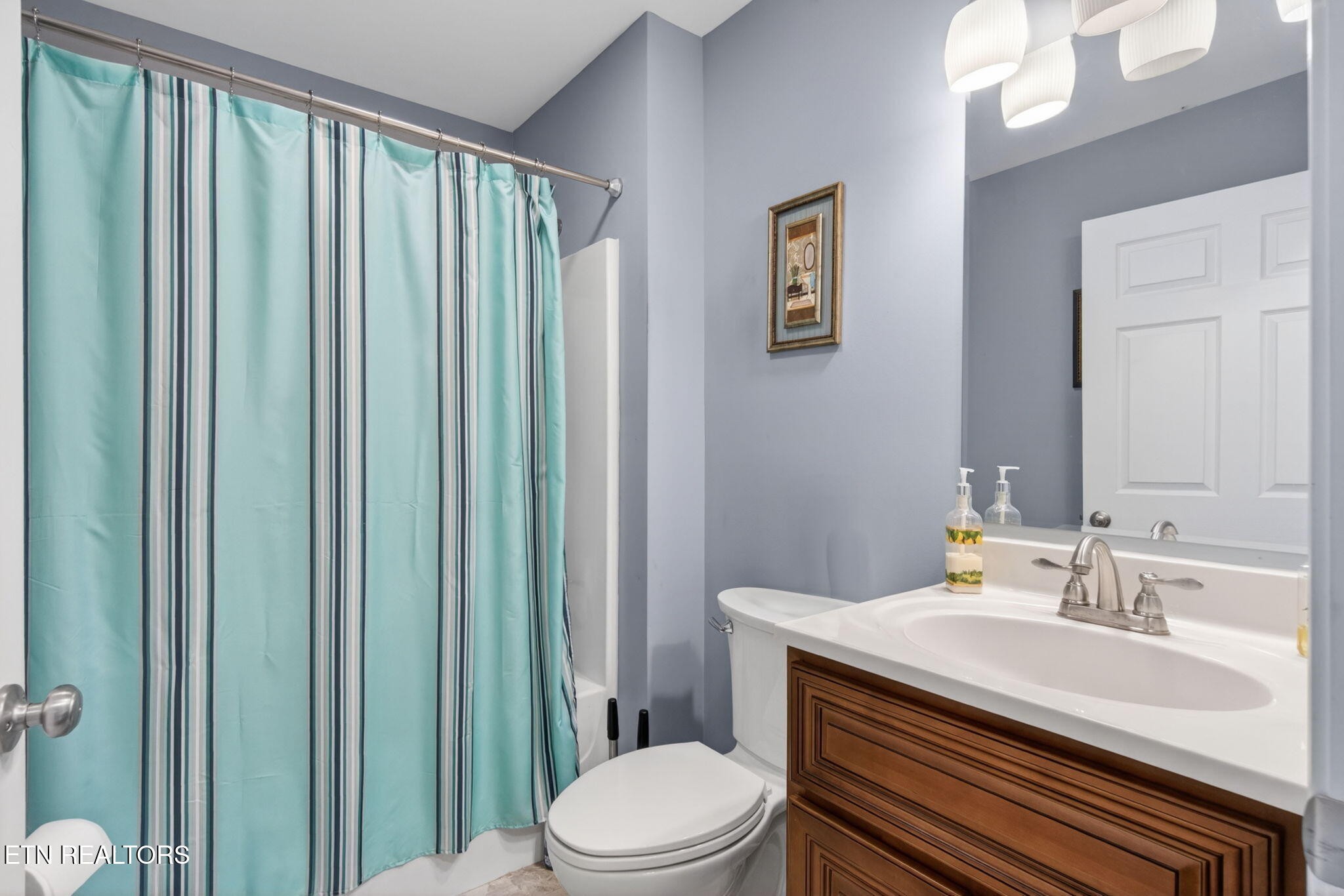 259 Freewill Ridge Road Gainesboro, TN 38562 - Photo 10 of 36 a bathroom with a sink a toilet and shower