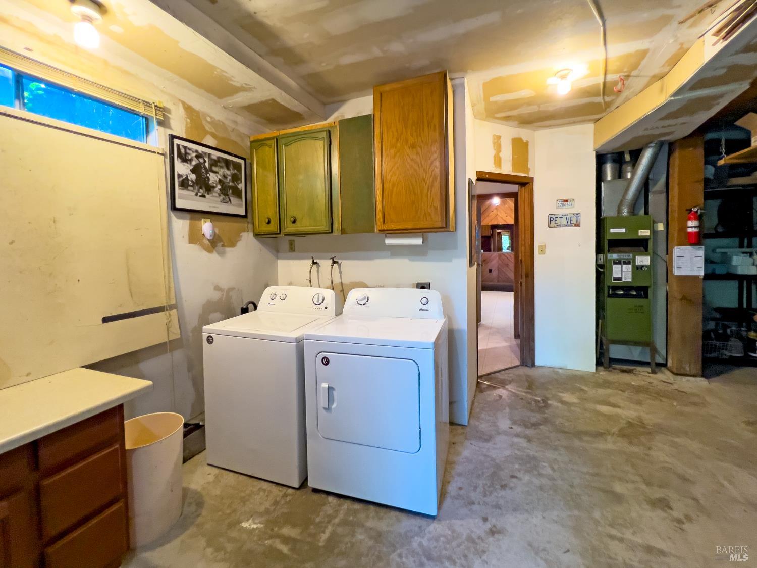 14600 Drake Road Guerneville, CA 95446 - Photo 28 of 45 Garage laundry nearing entrance to finished basement.