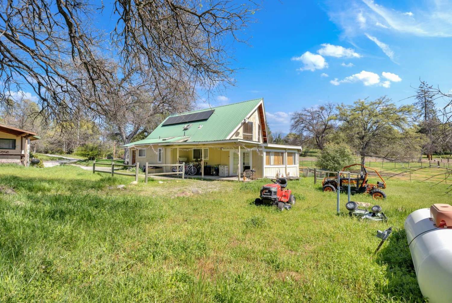 13489 Yorkshire Road Groveland, CA 95321 - Photo 27 of 35 a front view of house with yard and trees
