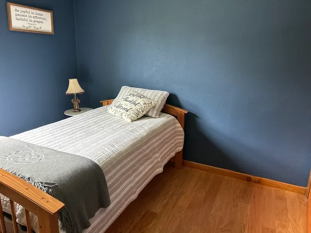 a bathroom with a sink a mirror and a shower