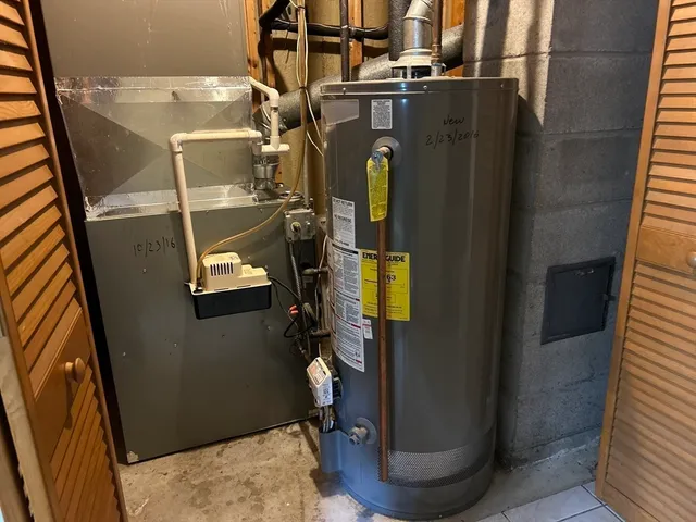 a view of a two chairs on the roof deck