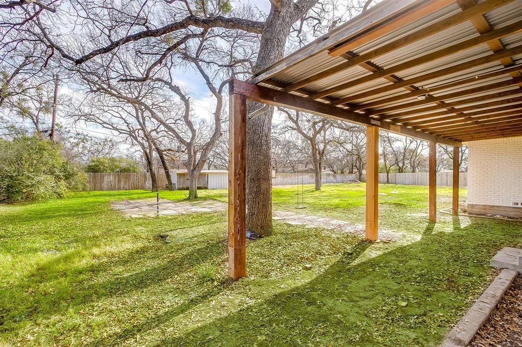 103 Vanshire Road West Lakeside, TX 76108 - Photo 33 of 39 a view of yard with swimming pool and garden